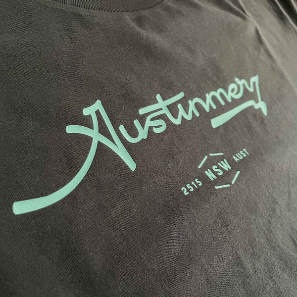 Austinmer Men’s Graphic T Shirt on Australian Cotton, Coal colour tee with seafoam  vinyl, Front, Close Up